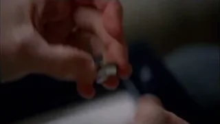 close-up of hand holding small object — Breaking Bad
