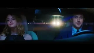 man and woman kissing in nightclub — La La Land