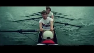 four men rowing on water — The Social Network