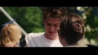 young couple conversing in park — The Amazing Spider Man 2