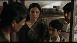 Woman in saree in tense conversation — Life of Pi