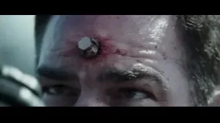 man's face with bloody forehead wound — Deadpool