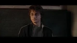 young man deep in thought by window — Harry Potter and the Goblet of Fire