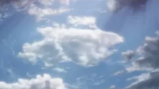 blue sky with white clouds and sun rays — Weathering with You