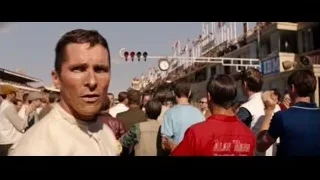 Ken Miles in racing suit at race track — Ford v Ferrari