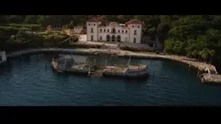 Aerial view of large mansion with red roof — Iron Man 3