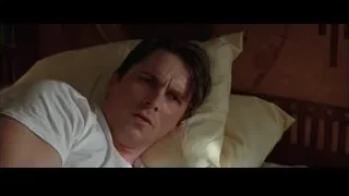 Man lying in bed deep in thought — Batman