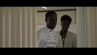 young man in hallway — F1