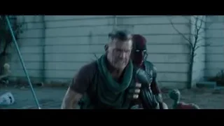 Deadpool and man by brick building — Deadpool 2