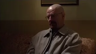 Bald man sitting on couch in thought — Breaking Bad