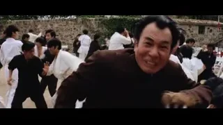 man performing martial arts with others — Bruce Lee: Enter The Dragon