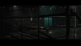 Person with gun in underground warehouse — Now You See Me