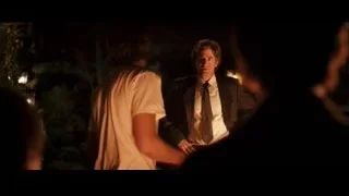 man in suit standing in garden at night — Jobs