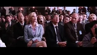 Woman speaking into microphone to crowd — Iron Man