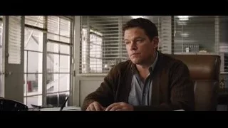 Man deep in thought at office desk — Ford v Ferrari