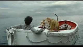 man in boat with tiger — Life of Pi