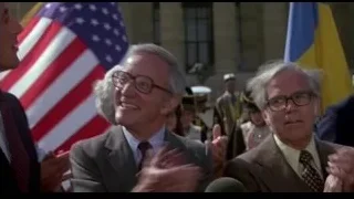men speaking at political rally — Rocky III