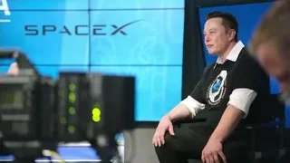 Elon Musk in front of SpaceX screen — Elon Musk: Return to Space