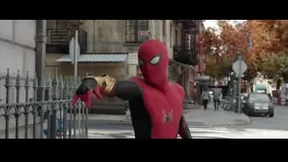 Spiderman standing on street with sparkler — Spiderman: No Way Home