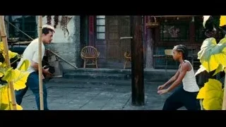 young girl dancing in outdoor courtyard — The Karate Kid