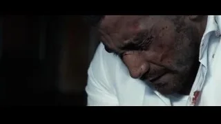 close-up of a man's bloody and bruised face — Southpaw