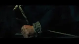 man tied up with rope — John Wick: Chapter 4