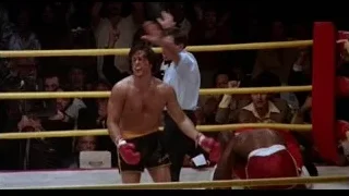 two men boxing in a ring — Rocky III