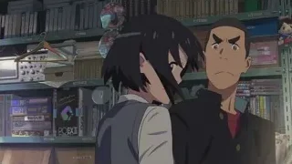 two characters in front of bookshelf — Your Name
