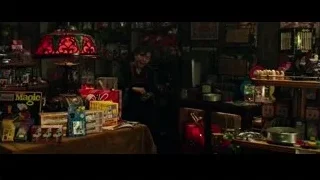 Elderly woman standing in cluttered store — Now You See Me 2