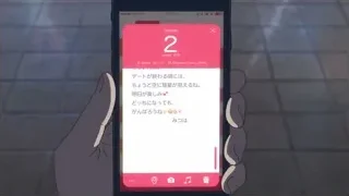 Hand holding smartphone with pink screen — Your Name
