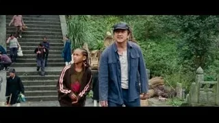man and girl walking down garden stairs — The Karate Kid