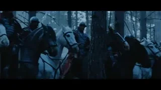 men in armor riding horses through forest — Gladiator
