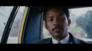 Man in car looking out window — The Persuit of Happyness
