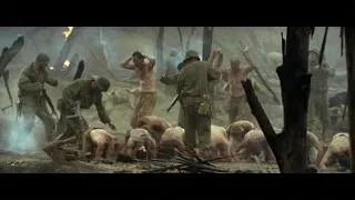 Soldiers in forested area with smoke and flames — Hacksaw Ridge
