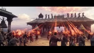 man with sword at burning temple battle — Doctor Strange 2