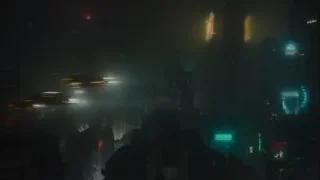 futuristic city skyline with flying cars at night — Blade Runner 2049