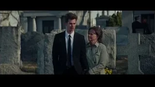 Man and woman in cemetery with tombstones — The Amazing Spider Man 2