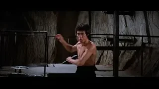 Bruce Lee with sword in martial arts stance — Bruce Lee: Enter The Dragon