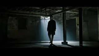 Person in long coat in abandoned building — Fight Club
