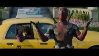 Deadpool with yellow taxi — Deadpool 2