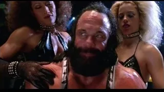 man with two women in wrestling ring — Spider Man