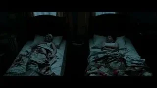 two people lying on a bed — Hacksaw Ridge