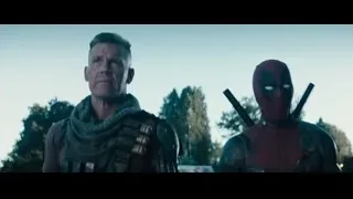 Deadpool and man standing with weapons — Deadpool 2