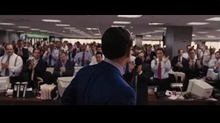 group of people clapping in office — The Wolf Of Wall Street