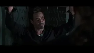 man with mustache and raised arms — Iron Man 3