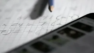 mathematical equations on paper with pencil — Screened Out