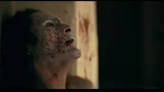 man's face covered in blood — Joker