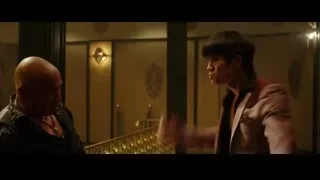 two men in dimly lit room, one bald — Bruce Lee: Birth of The Dragon