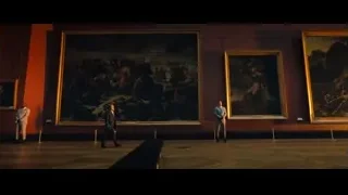 large painting hanging in museum — John Wick: Chapter 4